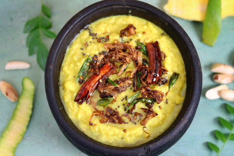 Jackfruit Seed Raw Mango Curry also known in Kerala as Chakkakuru Manga Curry